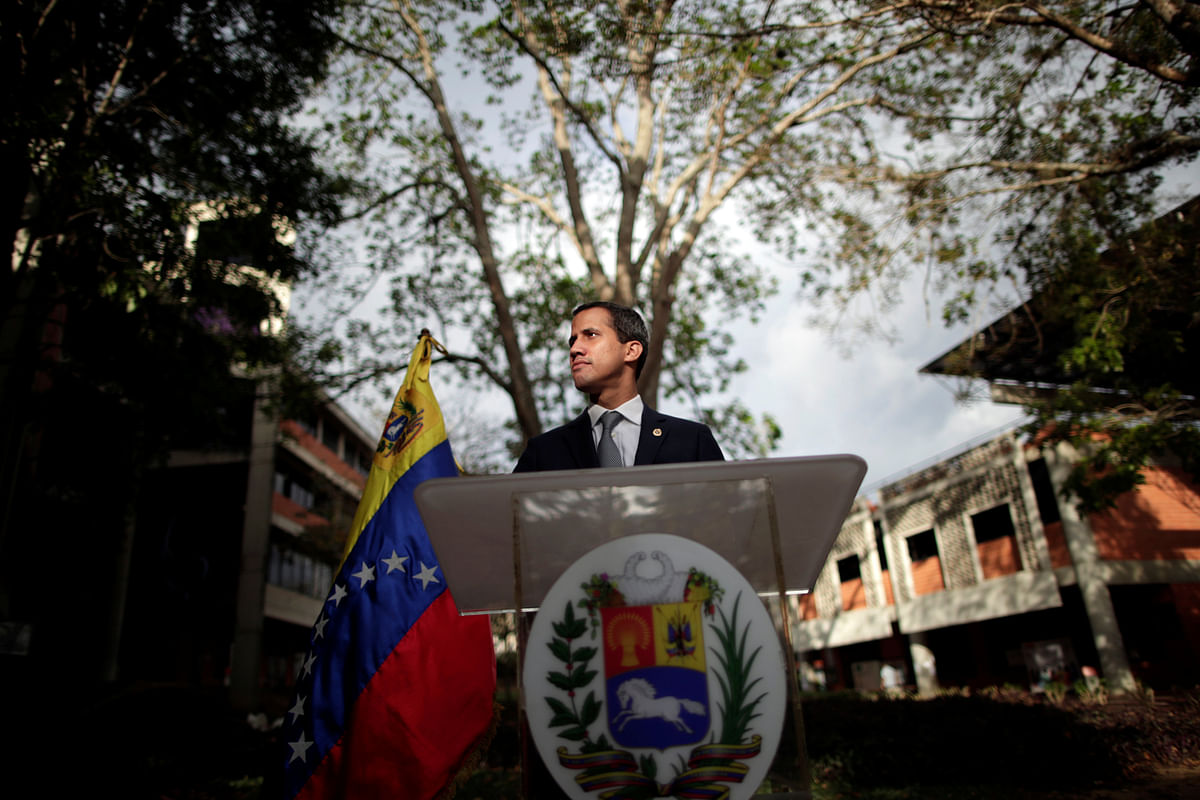 Venezuelan opposition leader Juan Guaido, who many nations have recognised as the country`s rightful interim ruler, looks on after a meeting with workers of Venezuela`s state oil company PDVSA in Caracas, Venezuela, on 3 May 2019. Reuters