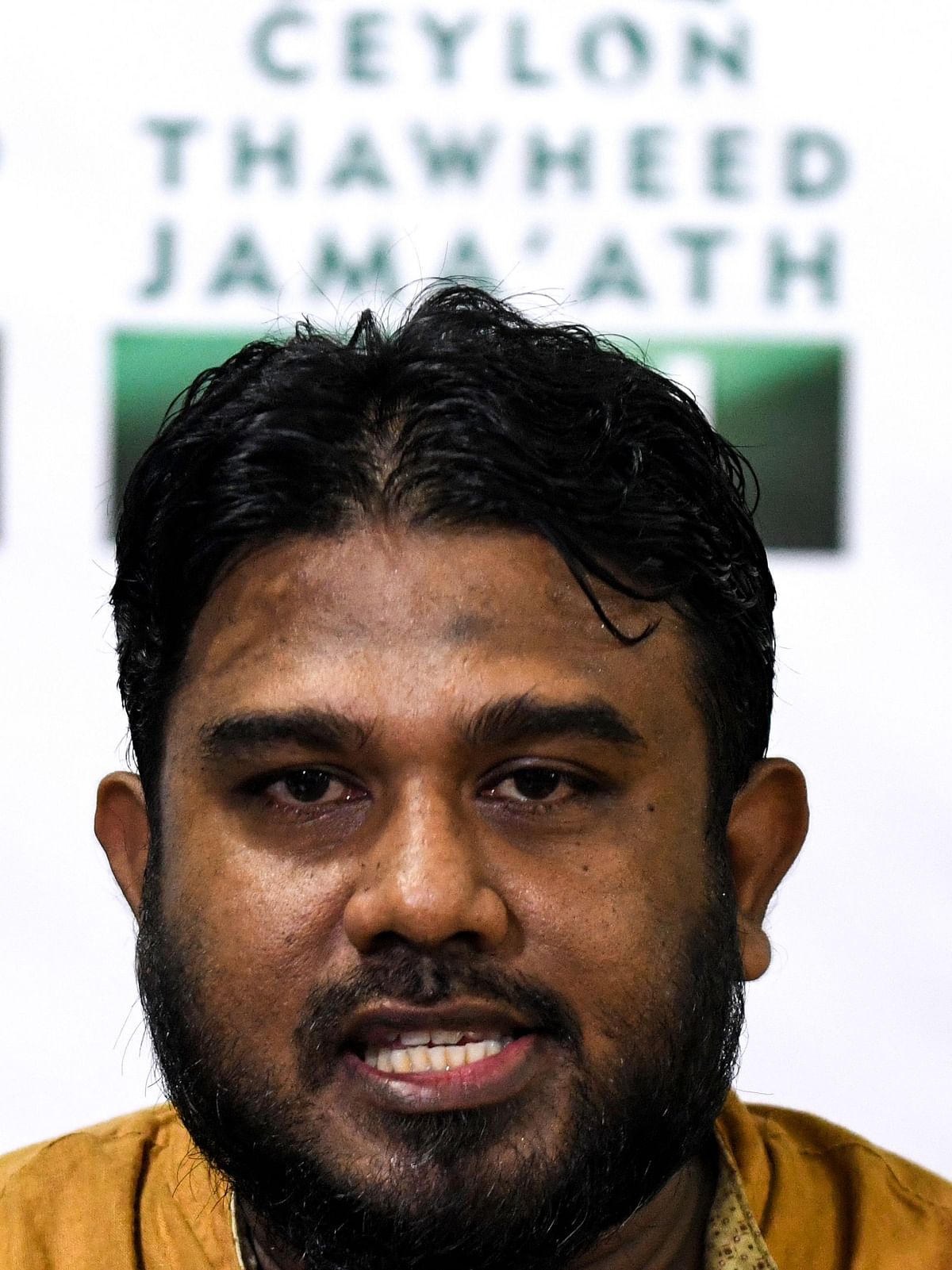 In this photo taken on 2 May 2019, R. Abdul Razik, a leader of the moderate Ceylon Thowheed Jama`ath (CTJ) group, speaks during a press conference in Colombo. While Sri Lanka Easter suicide attacks mastermind Zahran Hashim made public calls for the death of non-Muslims, he worked for months in private chatrooms to persuade six young men to sacrifice themselves, Muslim community leaders say. Photo: AFP