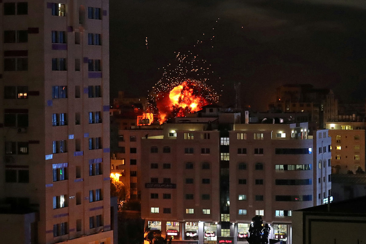A ball of fire is seen during an Israeli air strike in Gaza City on 4 May 2019. Reuters