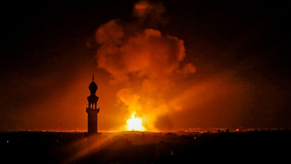 3picture taken in Rafah in the southern Gaza Strip, on 5 May 2019 shows an explosion following an airstrike by Israel. Gaza militants fired a barrage of rockets at Israel, who responded with airstrikes, officials said, as a fragile ceasefire again faltered. Photo: AFP