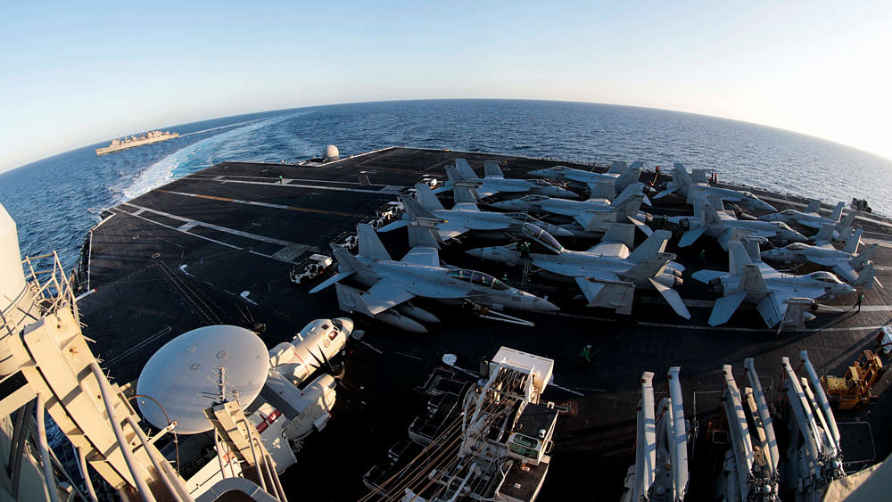 he Nimitz-class aircraft carrier USS Abraham Lincoln (CVN 72) breaks away from the fast combat support ship USNS Arctic (T-AOE 8) after an underway replenishment-at-sea in the Mediterranean Sea in this 29 April 2019 photo supplied by the US Navy. Photo: Reuters