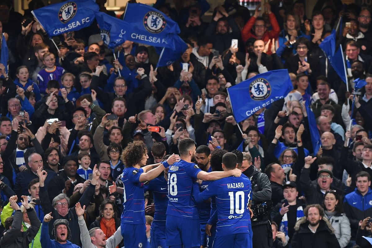Chelsea's English midfielder Ruben Loftus-Cheek celebrates with teammates after he scores the team's first goal during the UEFA Europa League semi-final second leg football match between Chelsea and Eintracht Frankfurt at Stamford Bridge in London on 9 May, 2019. Photo: AFP