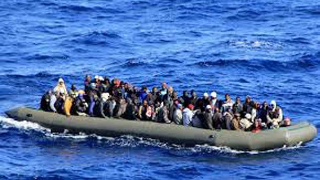 Migrants on a boat. File Photo