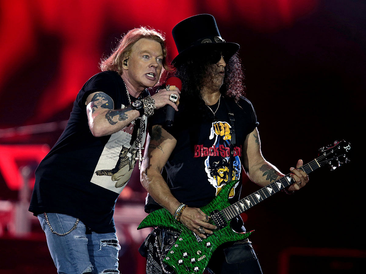 Axl Rose and Slash, lead singer and lead guitarist of US rock band Guns N` Roses, perform during their `Not in This Lifetime... Tour` at the du Arena in Abu Dhabi, United Arab Emirates on 25 November 2018. Reuters File Photo