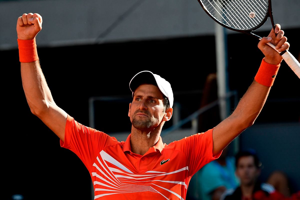 Serbia`s Novak Djokovic celebrates after defeating Austria`s Dominic Thiem during their ATP Madrid Open semi-final tennis match at the Caja Magica in Madrid on 11 May. Photo: AFP