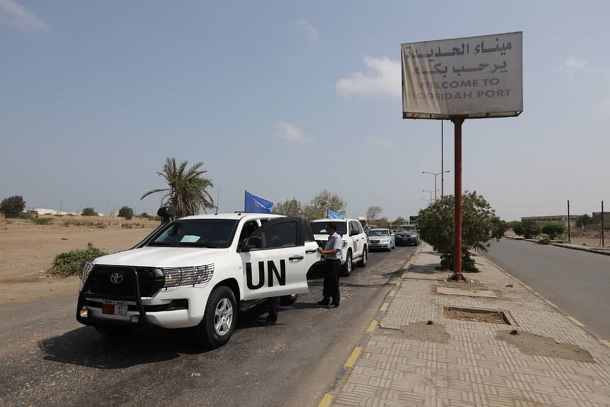 A picture taken on 11 May in the Red Sea port of Hodeidah shows UN vehicles arriving at the entrance of the Saleef port. A senior pro-government official in Yemen accused Huthi rebels of faking an announced pullout Saturday from three Red Sea ports, as a UN source said monitoring of the much delayed withdrawal in Hodeida province was underway. Photo: AFP