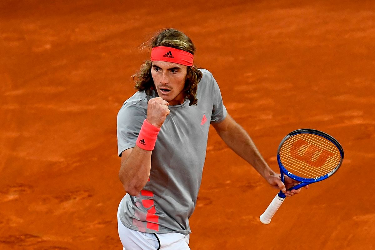 Greece`s Stefanos Tsitsipas celebrates winning a point against Spain`s Rafael Nadal during their ATP Madrid Open semi-final tennis match at the Caja Magica in Madrid on 11 May. Photo: AFP