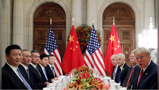 US president Donald Trump, US Secretary of State Mike Pompeo, US president Donald Trump`s national security adviser John Bolton and Chinese president Xi Jinping attend a working dinner after the G20 leaders summit in Buenos Aires, Argentina on 1 December 2018. Photo: Reuters