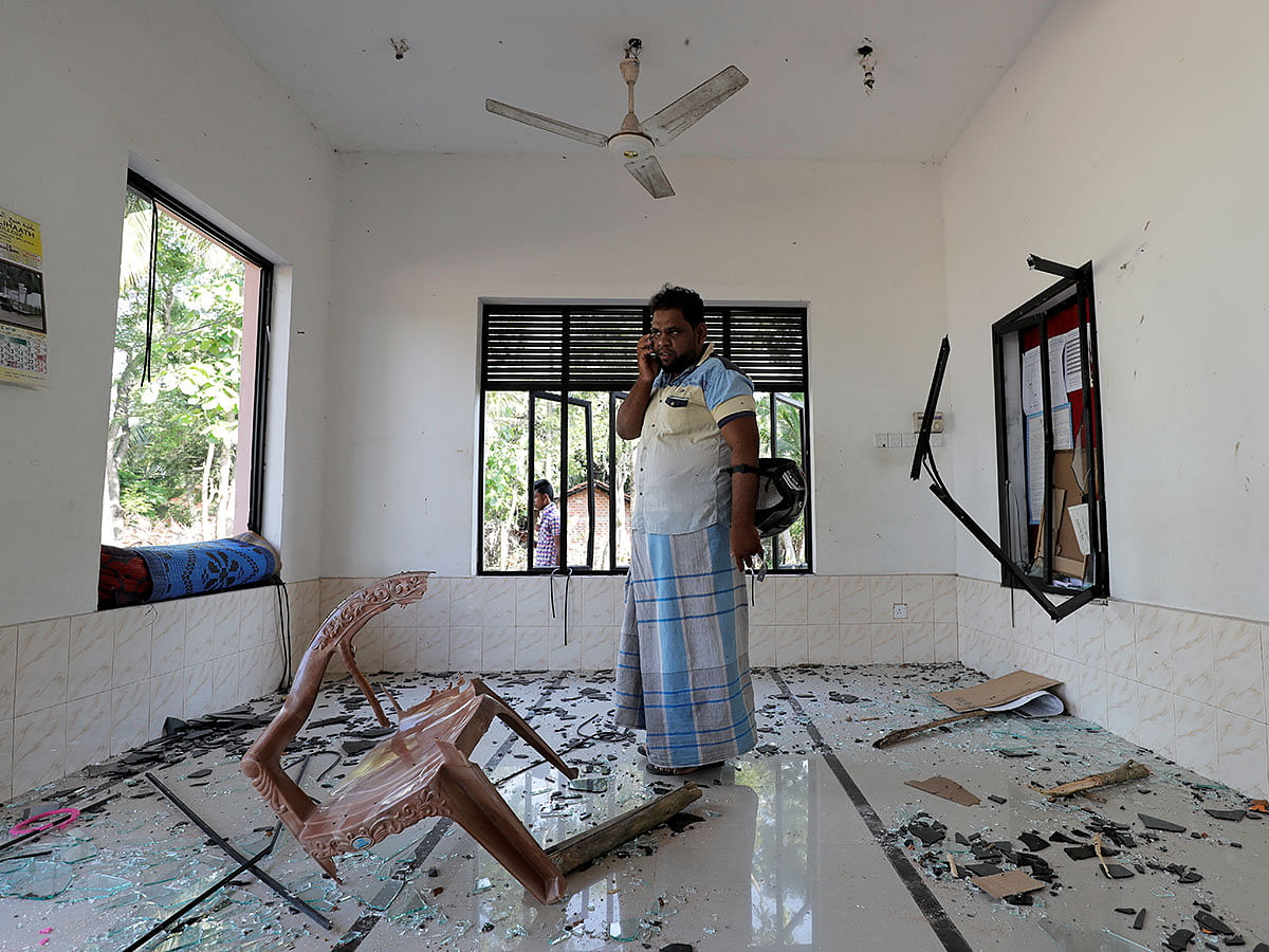 A Muslim man stands inside the Abbraar Masjid mosque after a mob attack in Kiniyama, Sri Lanka 13 May, 2019. Photo: Reuters