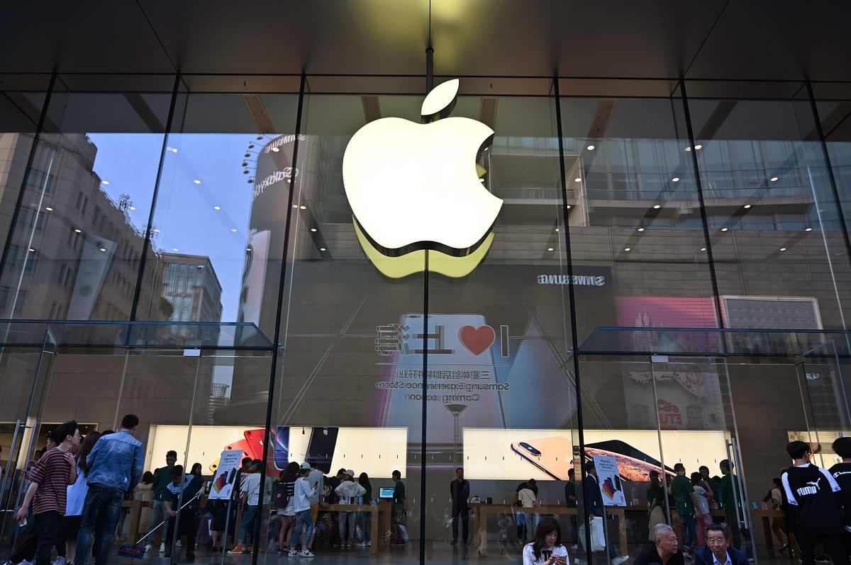 People visit an Apple store in Shanghai on 10 May 2019. Photo: AFP