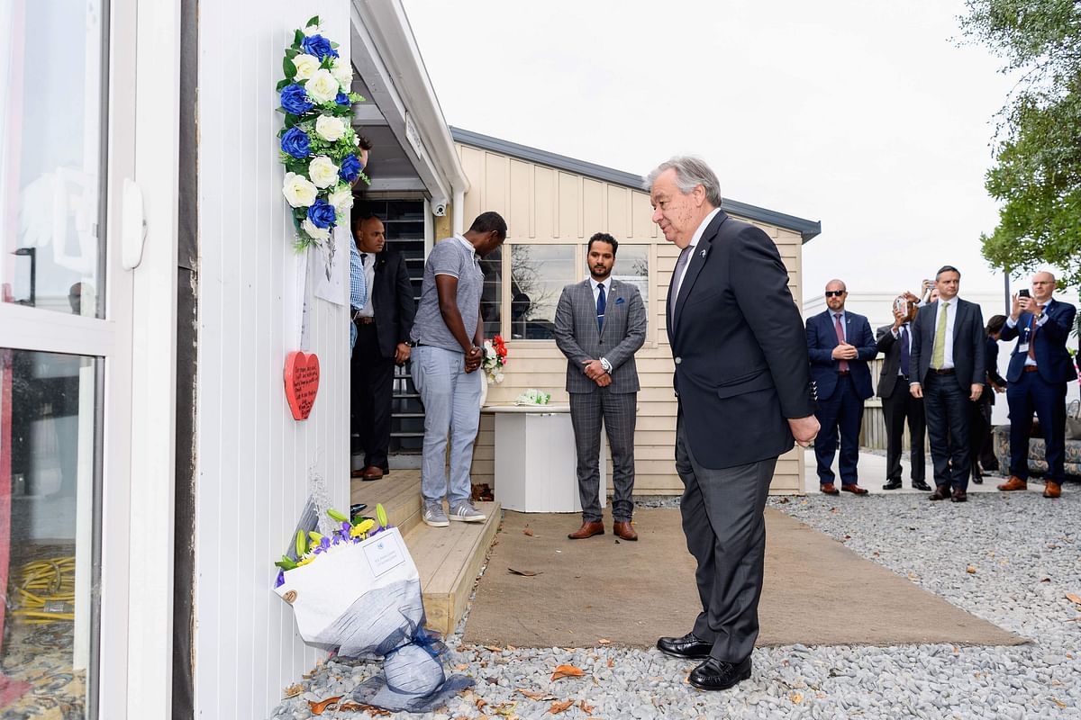 United Nations Secretary-General Antonio Guterres (C) pauses after laying a floral tribute to the victims to the twin mosque attacks at the Linwood Islamic Centre in Christchurch on 14 May, 2019. Photo: AFP