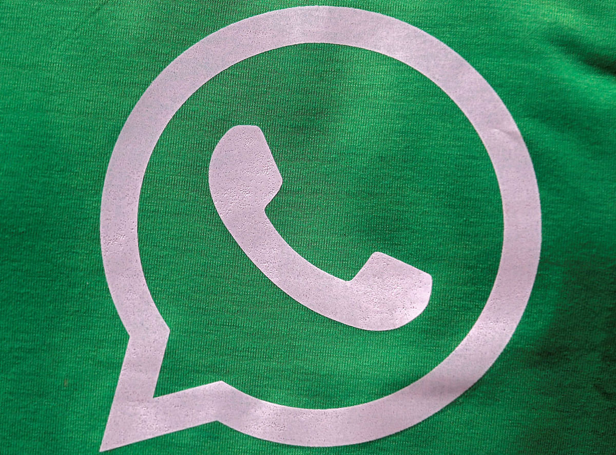 A logo of WhatsApp is pictured on a T-shirt worn by a WhatsApp-Reliance Jio representative during a drive by the two companies to educate users, on the outskirts of Kolkata, India, on 9 October 2018. Reuters File Photo