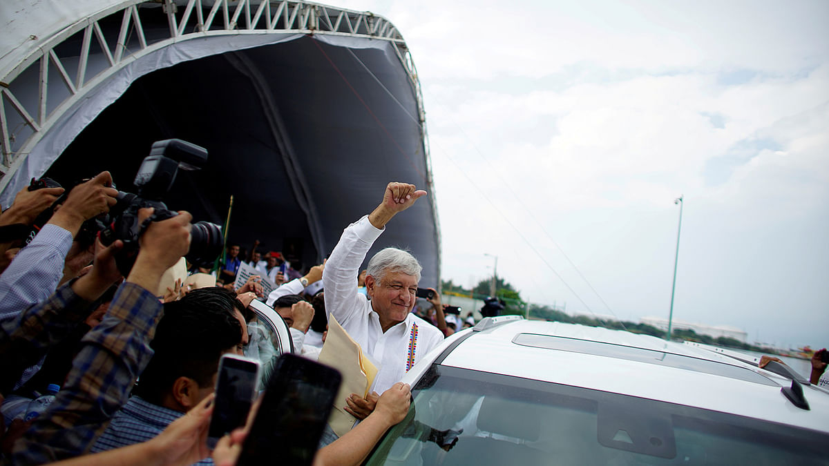 Mexico`s new President Andres Manuel Lopez Obrador reacts to supporters after an event to unveil his plan for oil refining in Paraiso. Photo: Reuters