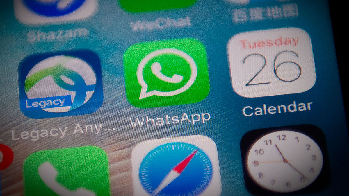 In this file photo taken on 26 September 2017, this photo illustration shows the Whatsapp application logo (C) on a smartphone screen in Beijing. WhatsApp on 14 May 2019 warned users to upgrade the application to plug a security hole that allowed for the injection of sophisticated malware that could be used to spy on journalists, activists and others. Photo: AFP