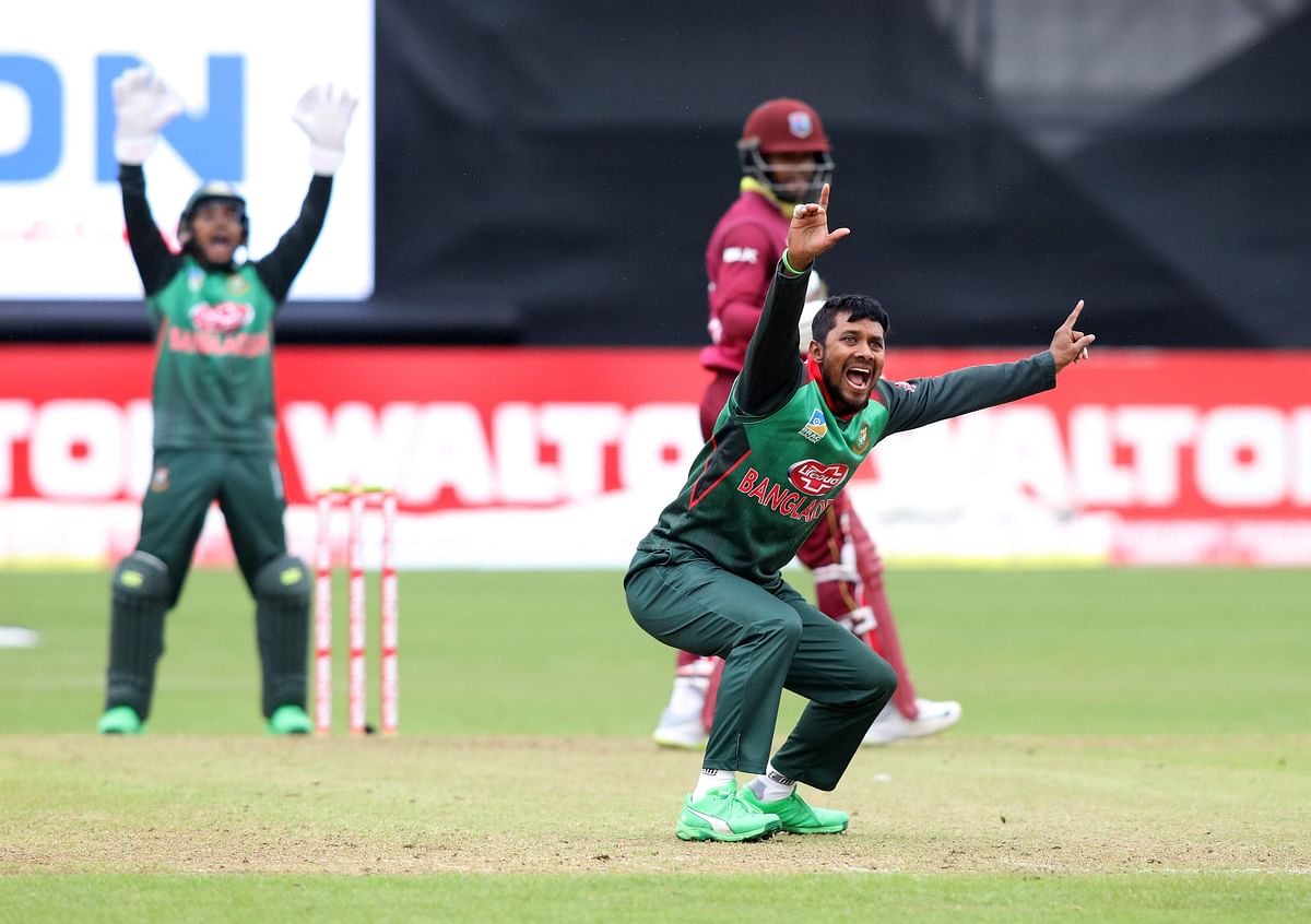 Bangladesh`s Sabbir Rahman (R) appeals unsuccessfully for a wicket during the one-day international Tri-Nation Series final between Bangladesh and West Indies at the Malahide cricket club, in Dublin on 17 May, 2019. Photo: AFP