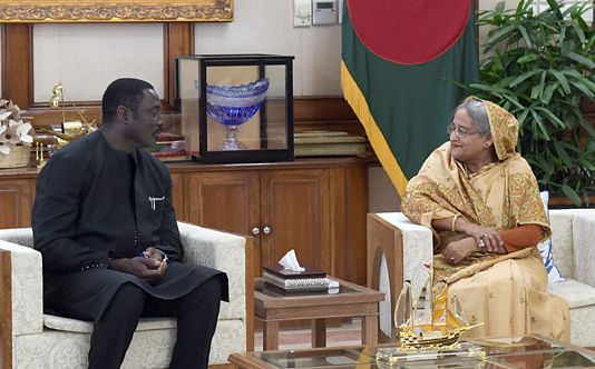 Gambian foreign minister Mamadou Tangara calls on prime minister Sheikh Hasina at her official Ganabhaban residence on Friday morning. Photo: PID