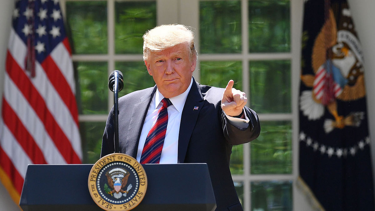 US president Donald Trump gestures as he delivers remarks on immigration at the Rose Garden of the White House in Washington, DC on 16 May 2019. Photo: AFP