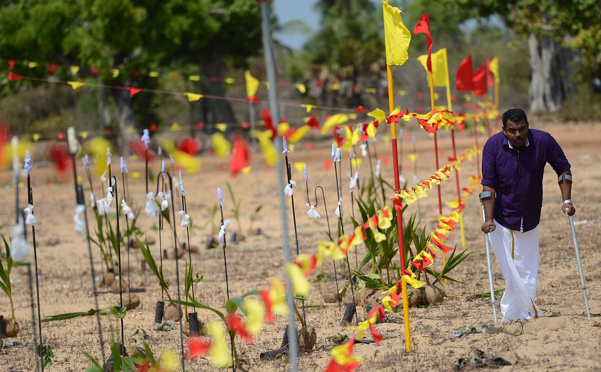 A Sri Lankan Tamil man takes part in a ceremony at Mullaivaukkal on the outskirts of Jaffna on 18 May 2019. Photo: AFP
