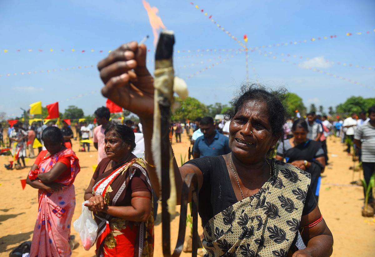 A Sri Lankan Tamil woman takes part in a ceremony at Mullaivaukkal on the outskirts of Jaffna on 18 May 2019. Photo: AFP