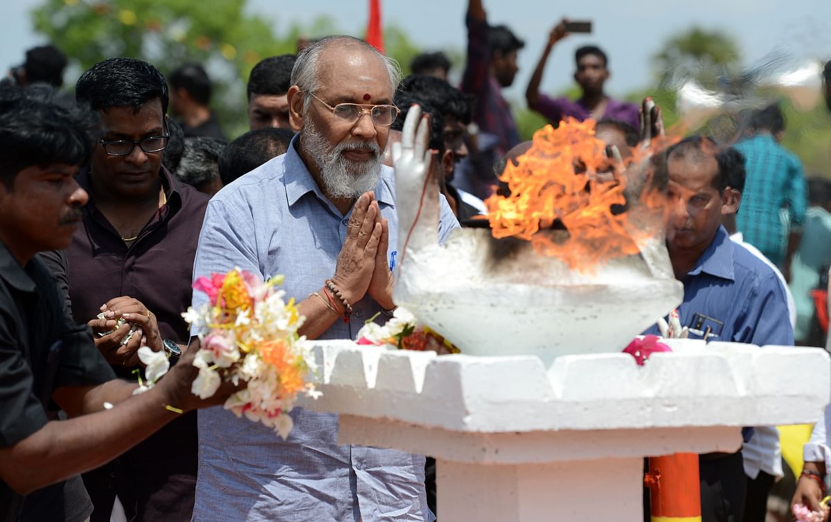 Sri Lankan Former chief minister of the northern province CV Vigneswaran (C) takes part in a ceremony at Mullaivaukkal on the outskirts of Jaffna on 18 May 2019. Photo: AFP