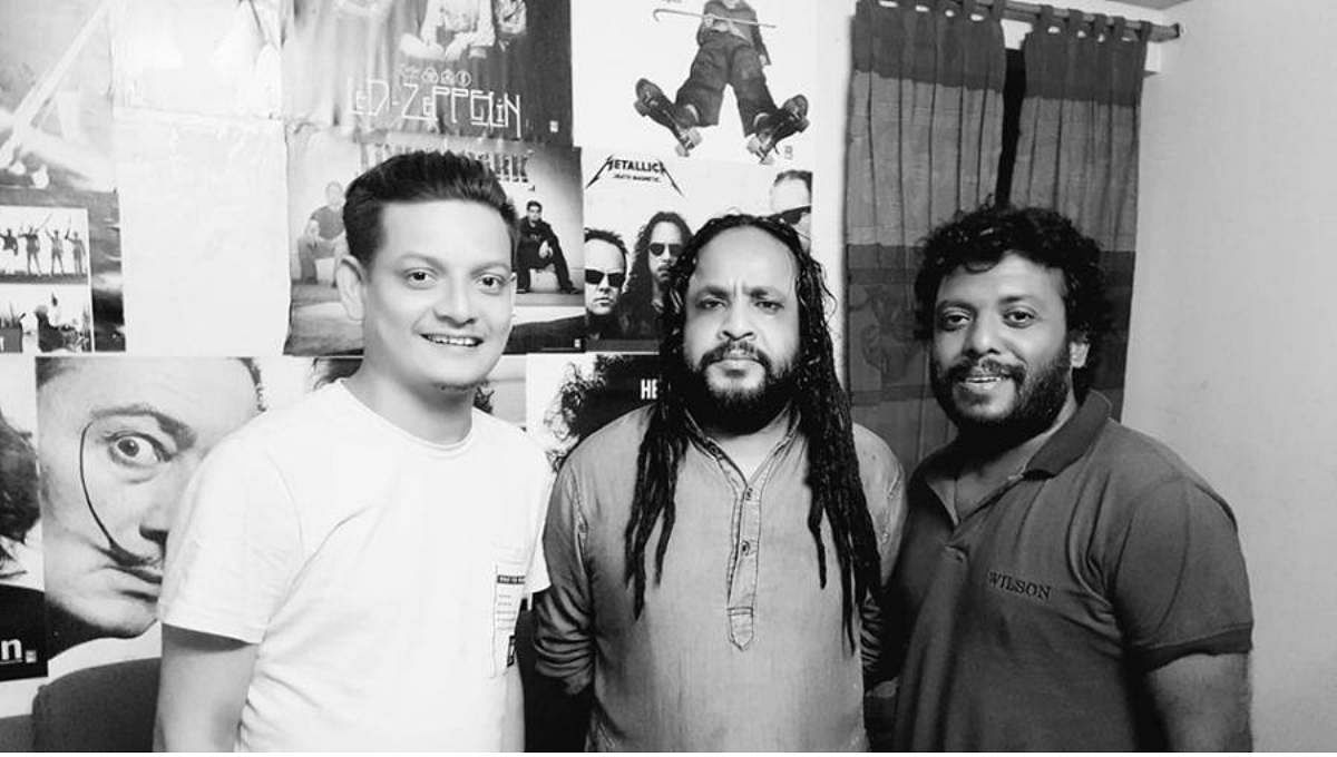 Popular singer Pothik Nobi (in the middle) with songwriter Lutfor Hasan and composer Shahriar Alam Marcell. Photo: UNB