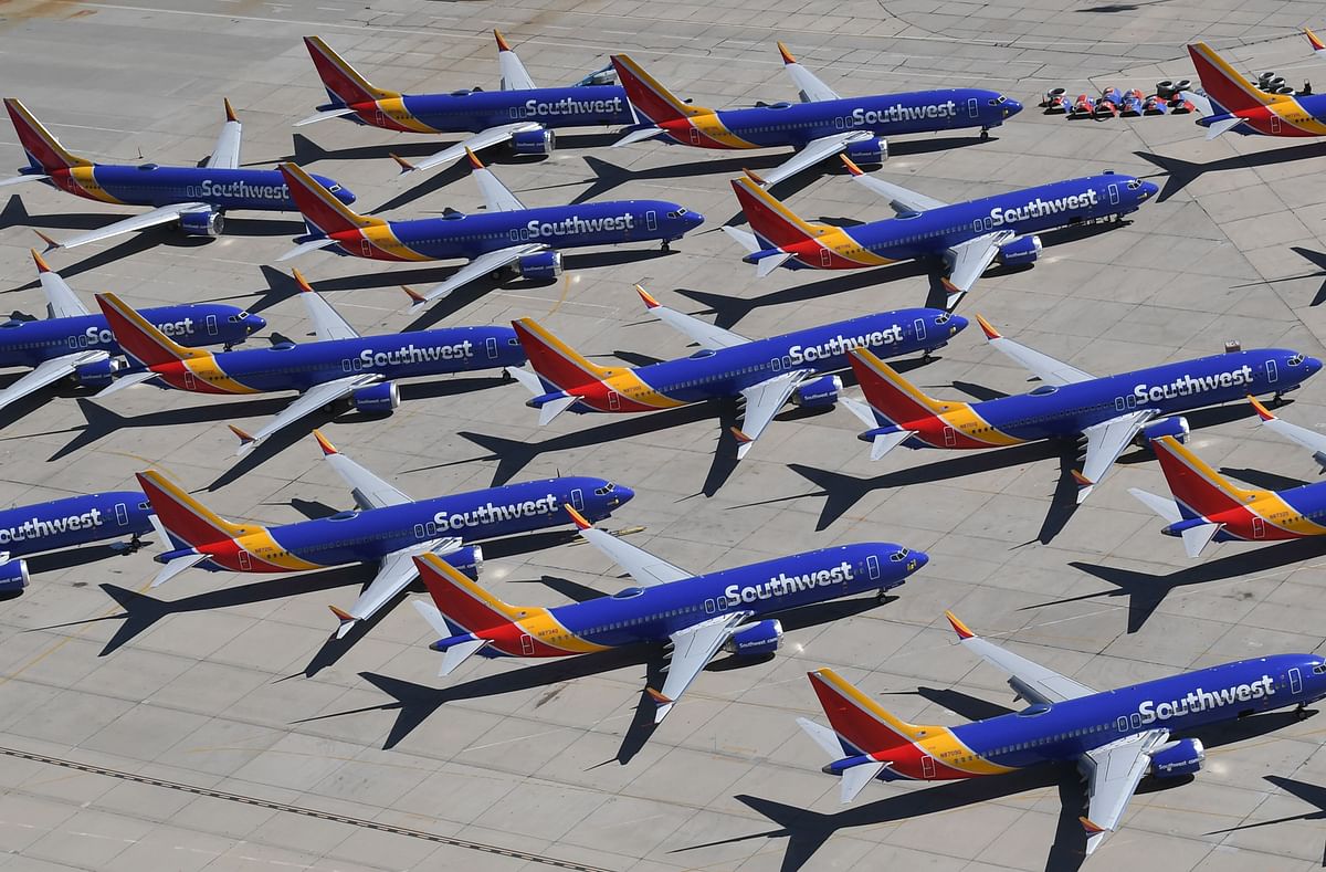 In this file photo taken on 28 March Southwest Airlines Boeing 737 MAX aircraft are parked on the tarmac after being grounded, at the Southern California Logistics Airport in Victorville, California. Photo: AFP