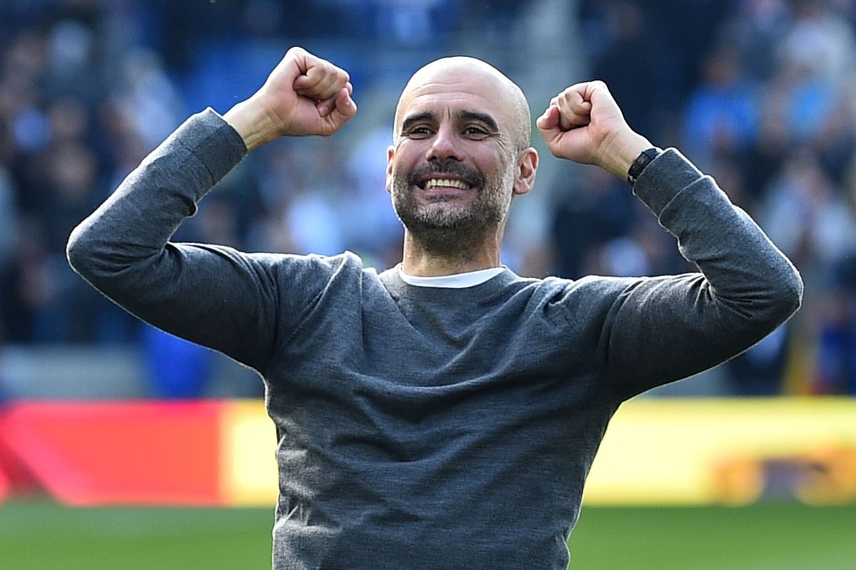 Guardiola has led Manchester City to the first ever domestic treble in English men`s football. AFP