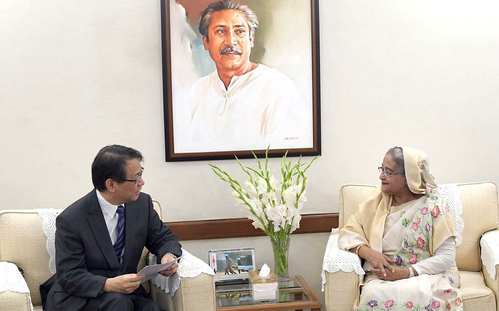 Japanese ambassador in Dhaka Hiroyasu Izumi calls on prime minister Sheikh Hasina at her official Ganabhaban residence on Monday. Photo: PID