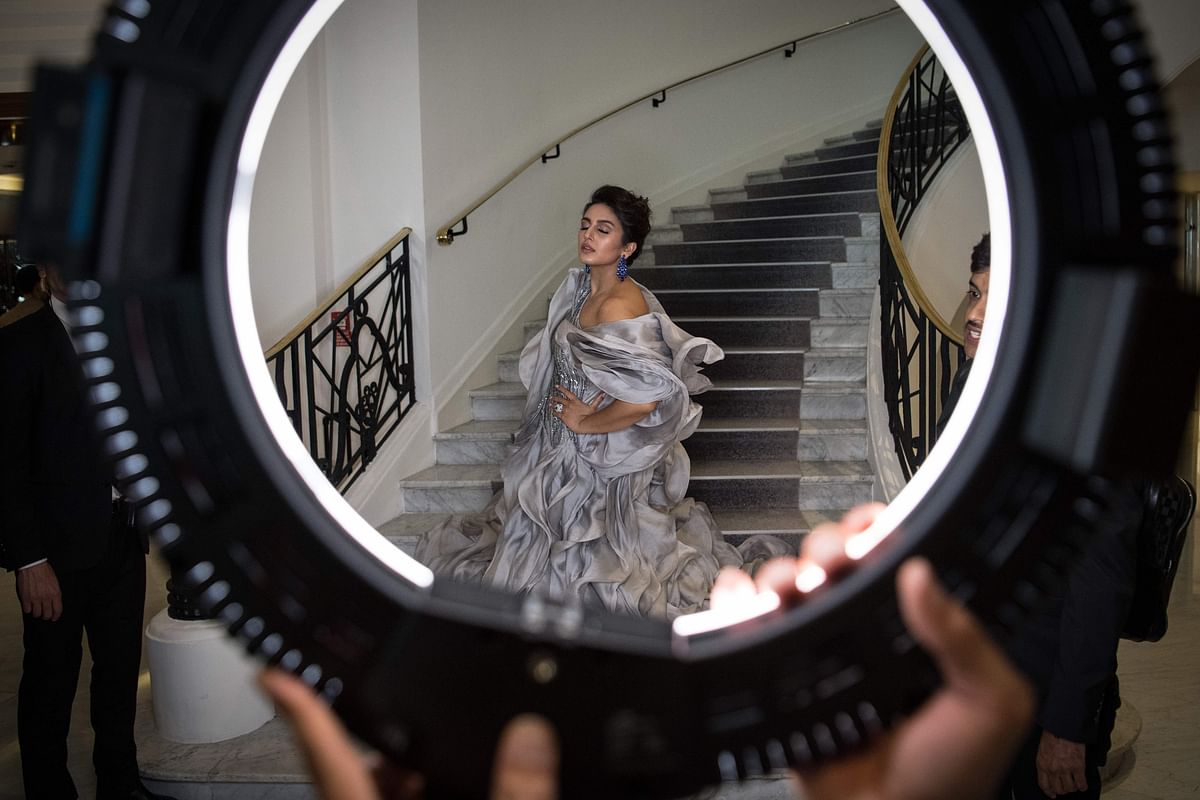 Indian actress Huma Qureshi poses with her dress before leaving for the Festival Palace to attend the screening of the film `A Hidden Life` at the 72nd edition of the Cannes Film Festival in Cannes, southern France, on 19 May 2019. Photo: AFP
