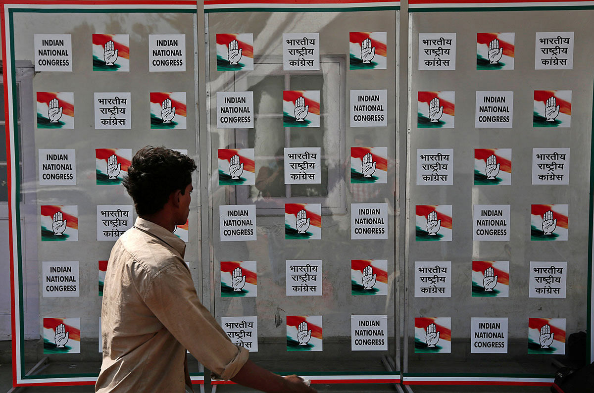 A man walks past the headquarters of India`s Congress party in New Delhi on 16 May, 2014. Photo: Reuters