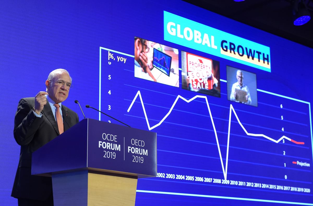 Angel Gurria, General Secretary of the Organisation for Economic Co-operation and Development (OECD), gestures as he presents the OECD Economic Outlook at the OECD headquarters in Paris on 21 May 2019. Photo: AFP