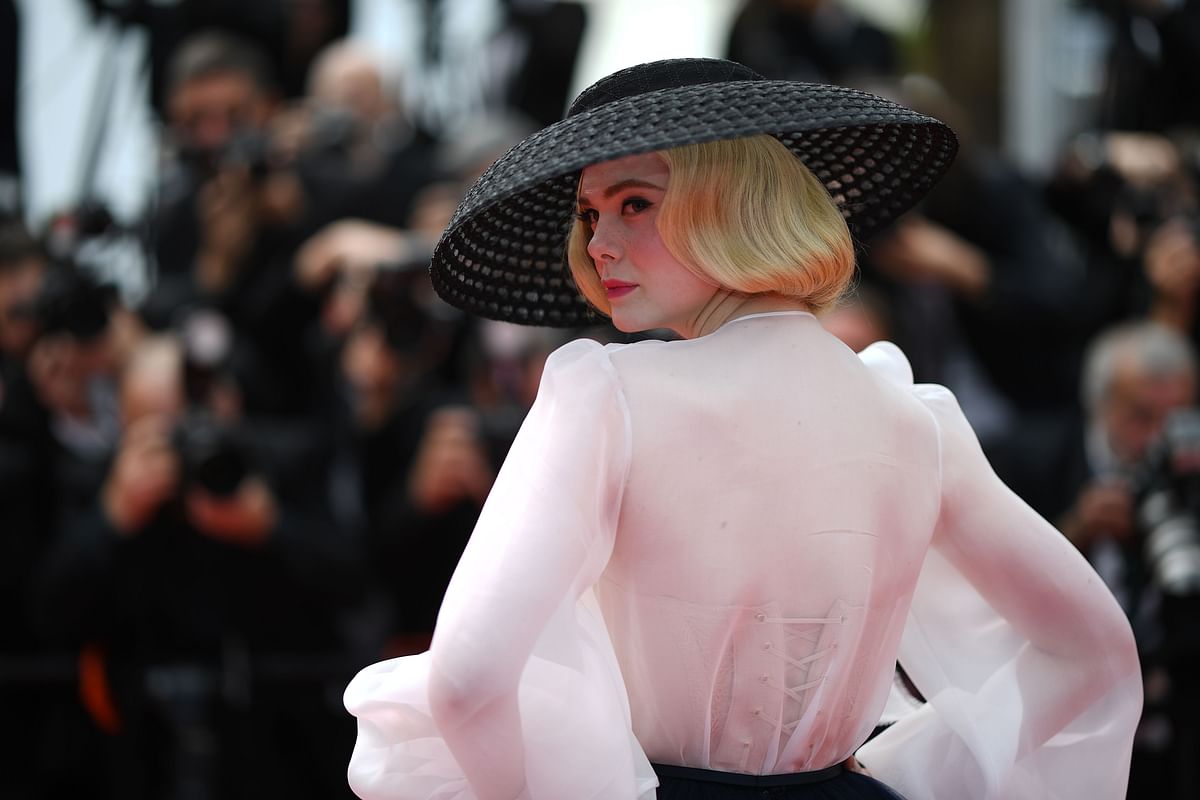 US actress and member of the jury of the Cannes Film Festival Elle Fanning poses as she arrives for the screening of the film `Once Upon a Time... in Hollywood` at the 72nd edition of the Cannes Film Festival in Cannes, southern France, on 21 May 2019. Photo: AFP