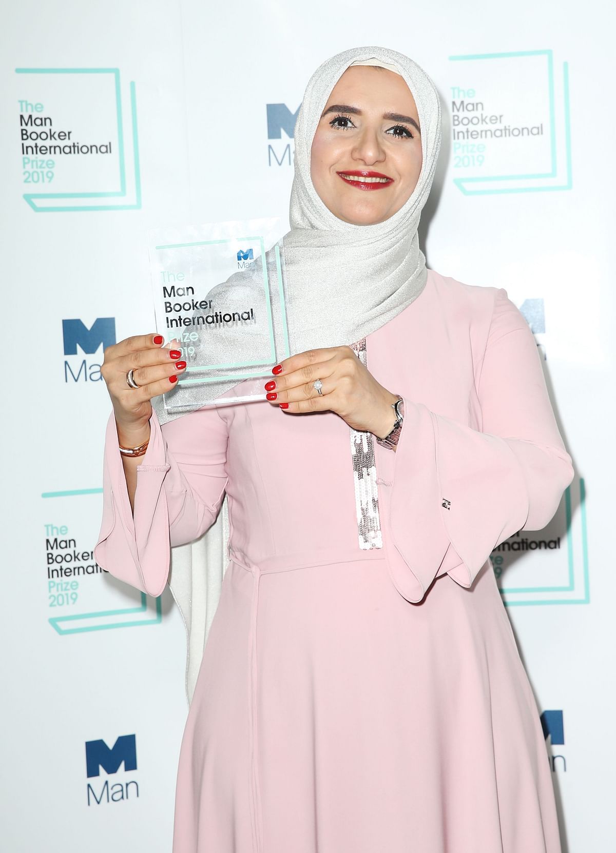Arabic author Jokha Alharthi poses after winning the Man Booker International Prize for the book `Celestial Bodies` in London on 21 May. Photo: AFP