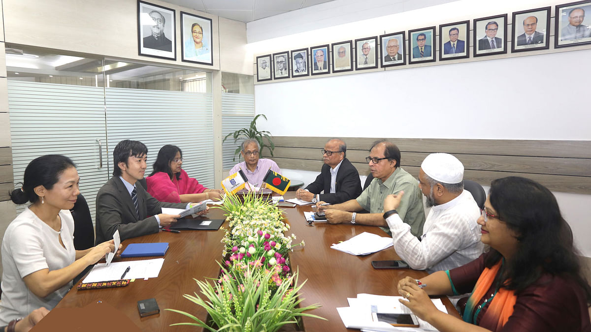 Three-member JICA delegation held a meeting with University Grants Commission acting chairman professor Mohammad Yousuf Ali Mollah at his office on Wednesday. Photo: UNB
