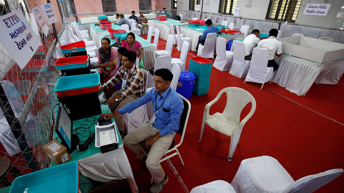 Election staff members work on their computers in a vote counting centre in Ahmedabad, India, on 22 May 2019. Reuters