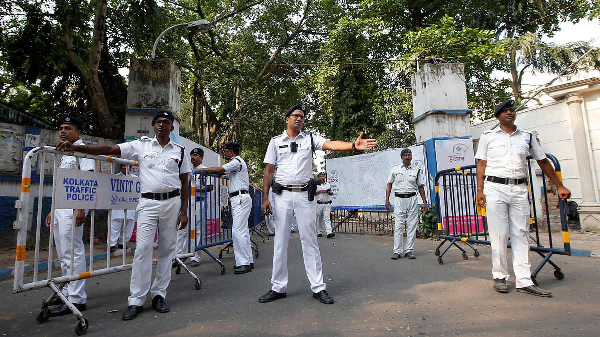 Police officers stand guard outside a vote counting centre in Kolkata, India, on 23 May 2019. Reuters