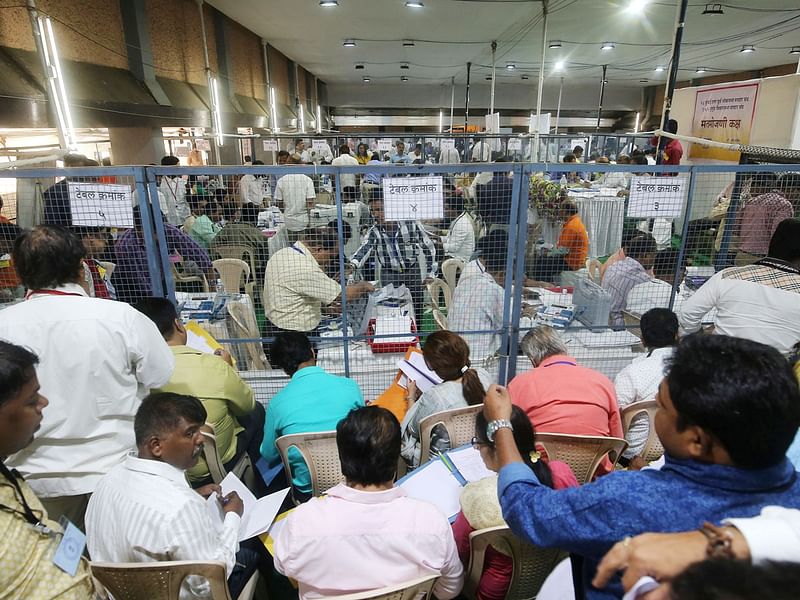 Election staff members count votes at a vote counting centre in Mumbai, India, on 23 May 2019. Reuters