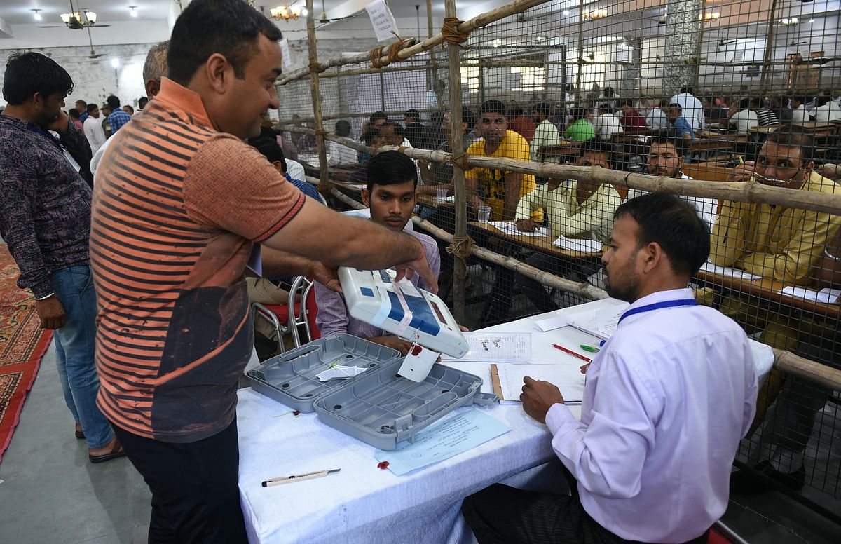 Indian election officials show an open Electronic Voting Machine (EVM) to counting agents at a counting centre in Faridabad in the northern Indian state of haryana on 23 May 2019. AFP