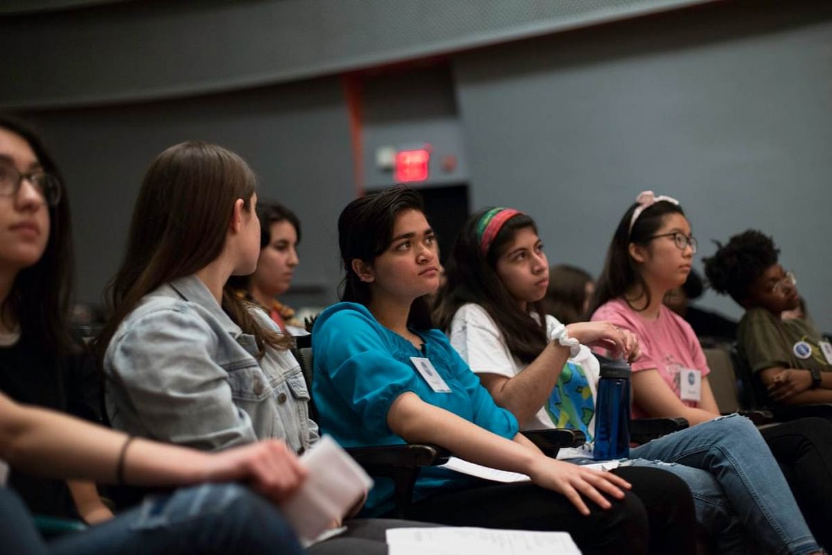 High school student poets listen to a poem about climate change in the New School auditorium as they prepare for final auditions for `Climate Speaks,` a social justice spoken word program, in New York City on 11 May, 2019. Photo: Thomson Reuters Foundation
