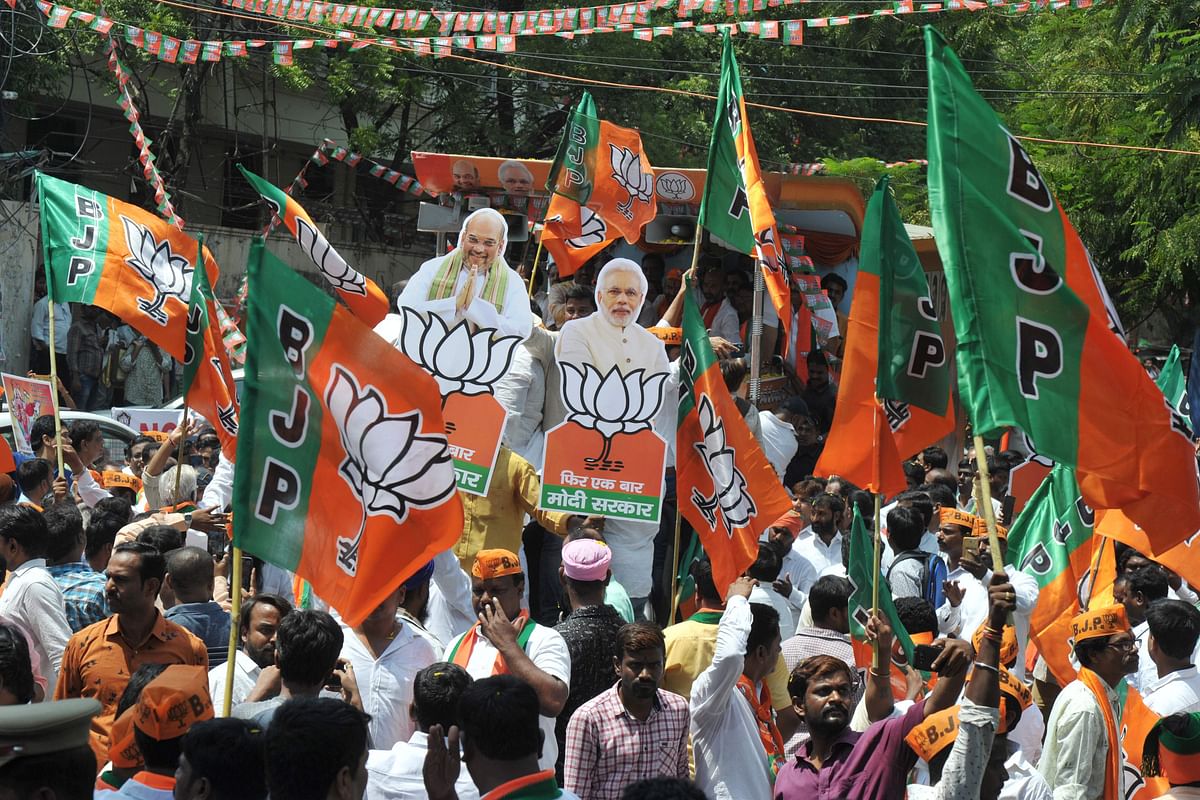 Indian supporters of Bharatiya Janata Party (BJP) participate in a celebration rally as BJP won four Member of Parliament seats in Telangana state in India`s general election, in Hyderabad on 24 May, 2019. Photo: AFP