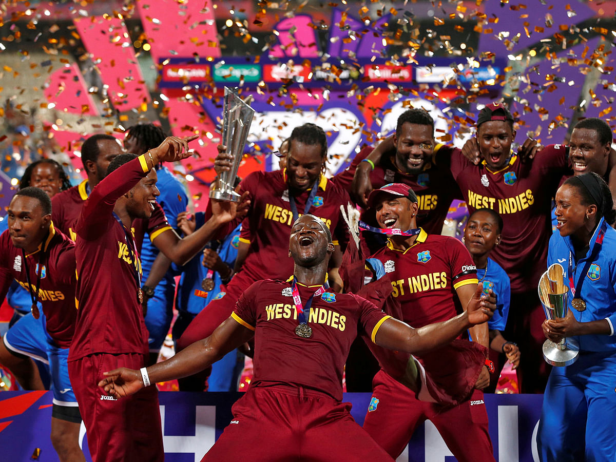 West Indies players celebrate with the trophy after winning the of World Twenty20 cricket tournament final against England in Kolkata, India on 3 April 2016. Reuters File Photo