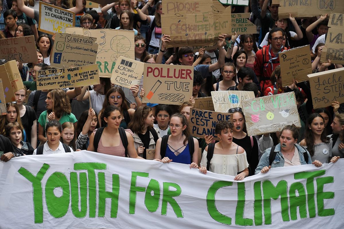 Youths take part in a protest demanding urgent action against global warming, on 24 May, 2019, in Strasbourg, eastern France. Photo: AFP