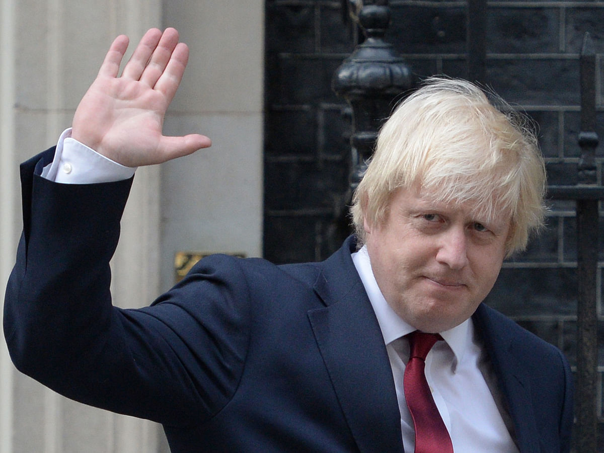 In this file photo taken on 13 July 2016 Newly appointed Foreign Secretary Boris Johnson waves as he leaves 10 Downing Street in central London on 13 July 2016 after new British prime minister Theresa May took office. Photo: AFP