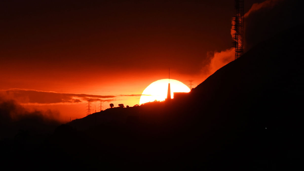 View of Caracas during sunset as seen from `El Avila` hill on 24 May 2019. Photo: AFP