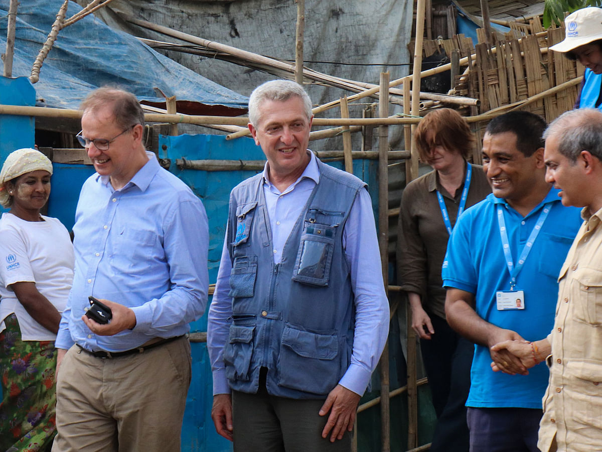UN High Commissioner for Refugees Filippo Grandi (C) visits a Rohingya camp in Sittwe on 22 May 2019. Photo: AFP