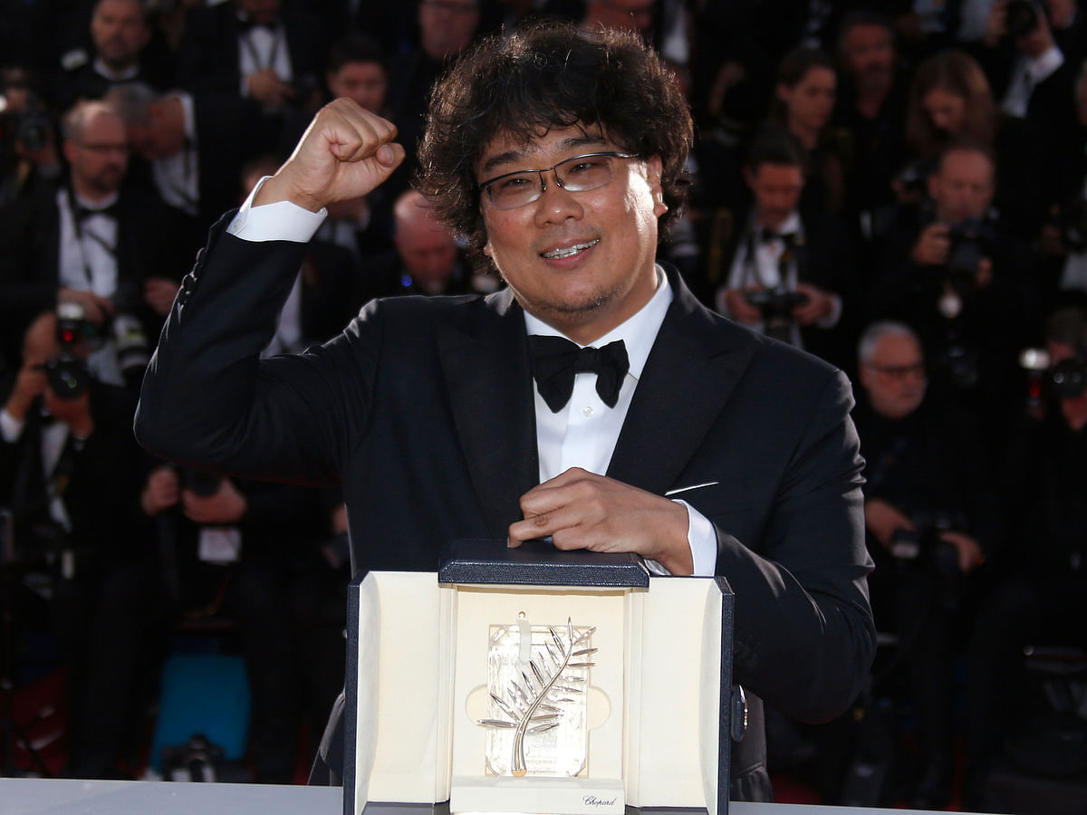 Director Bong Joon-ho, Palme d`Or award winner for his film `Parasite` (Gisaengchung), reacts at 72nd Cannes Film Festival in Cannes, France, 25 May, 2019. Photo: Reuters
