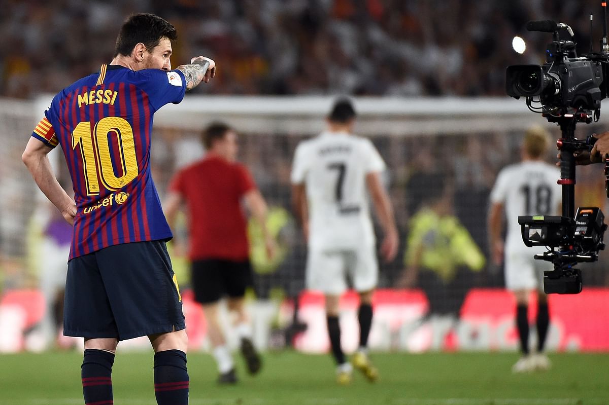 Barcelona`s Argentinian forward Lionel Messi gestures at the end of the 2019 Spanish Copa del Rey (King`s Cup) final football match between Barcelona and Valencia on 25 May 2019 at the Benito Villamarin stadium in Sevilla. Photo: AFP
