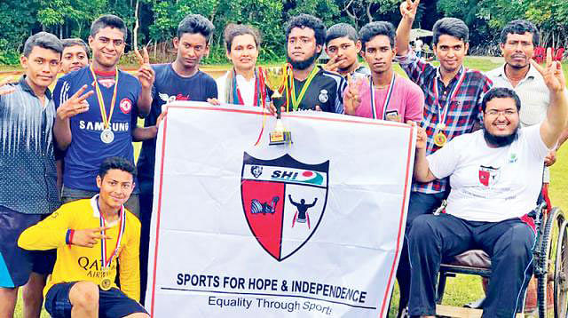 Sharmin Farhana Chowdhury with her organisation Sports for Hope and Independence (SHI) members. Photo: Collected