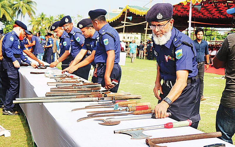 Arms surrendered by `extremists` File Photo