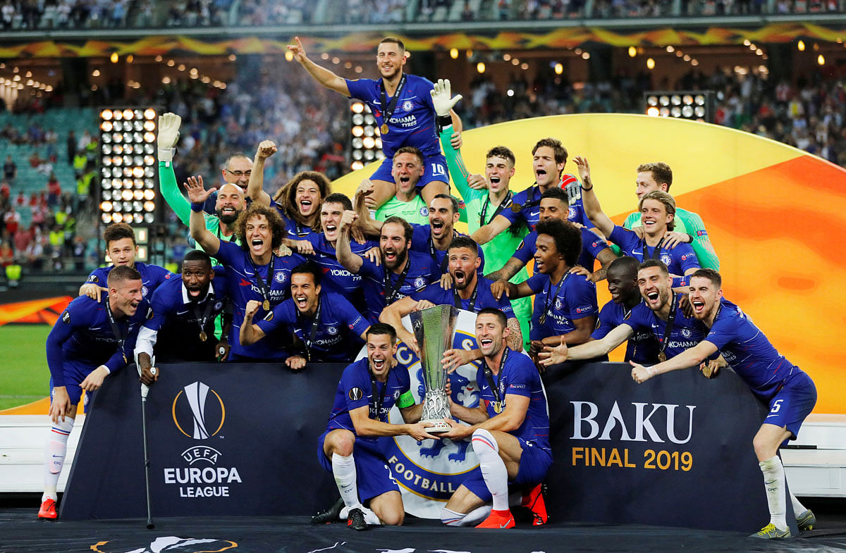 Chelsea`s Gary Cahill, Cesar Azpilicueta and team mates celebrate winning the Europa League with the trophy at Baku Olympic Stadium, Baku, Azerbaijan on 29 May 2019. Photo: Reuters